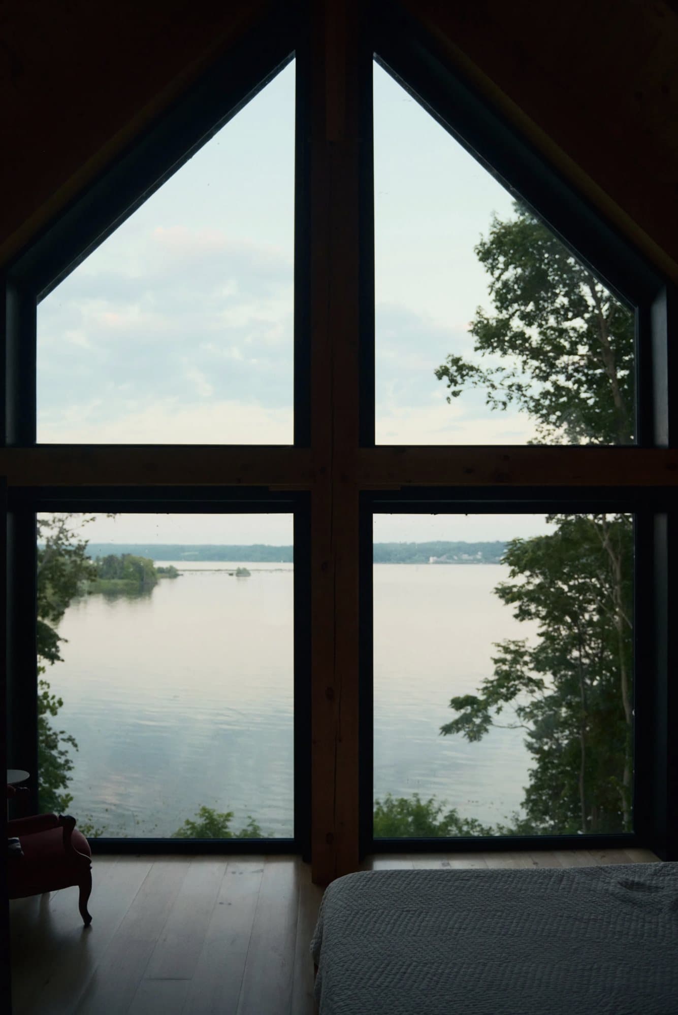 Window wall framing the Hudson River