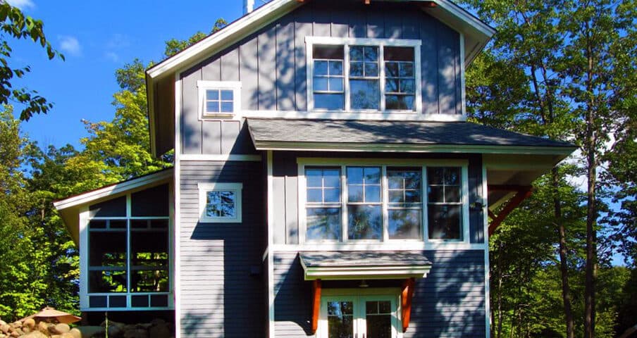 Front entry with timber brackets and sheltering canopy