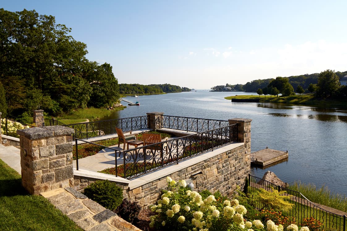 Rebuilt waterfront boat house at the end of the lawn