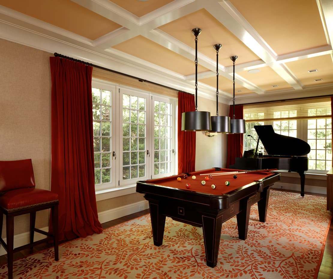 Family game room with pool table and grand piano