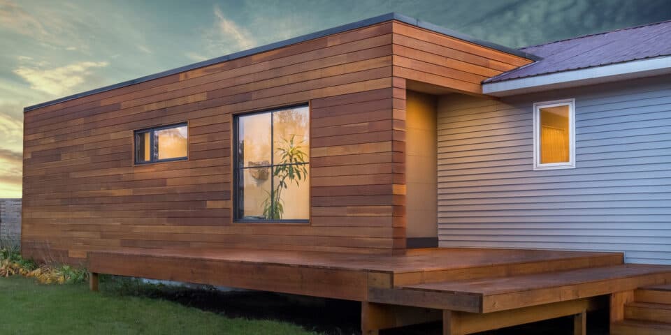 Modern ranch house exterior with wood cladding