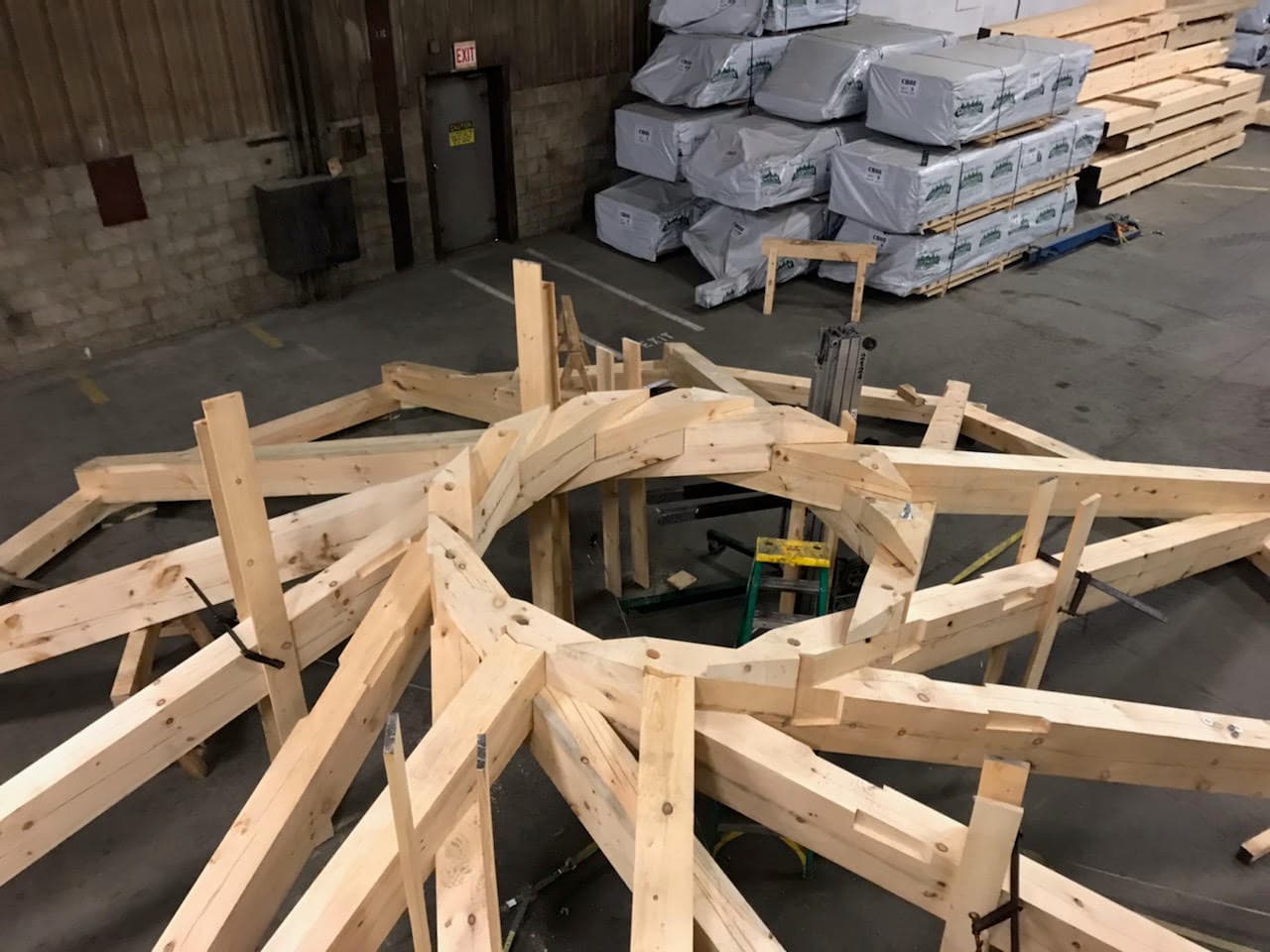 Reciprocal timber frame during shop assembly