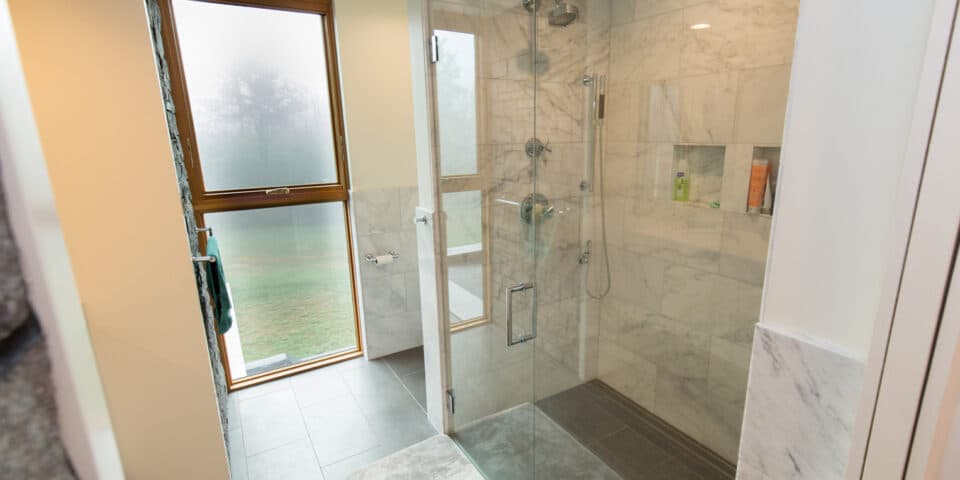 Primary bath with marble walk-in shower