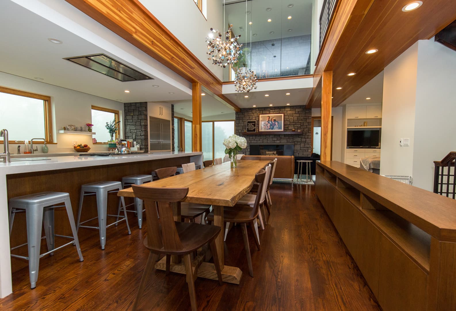 Double-height dining space open to the kitchen and great room