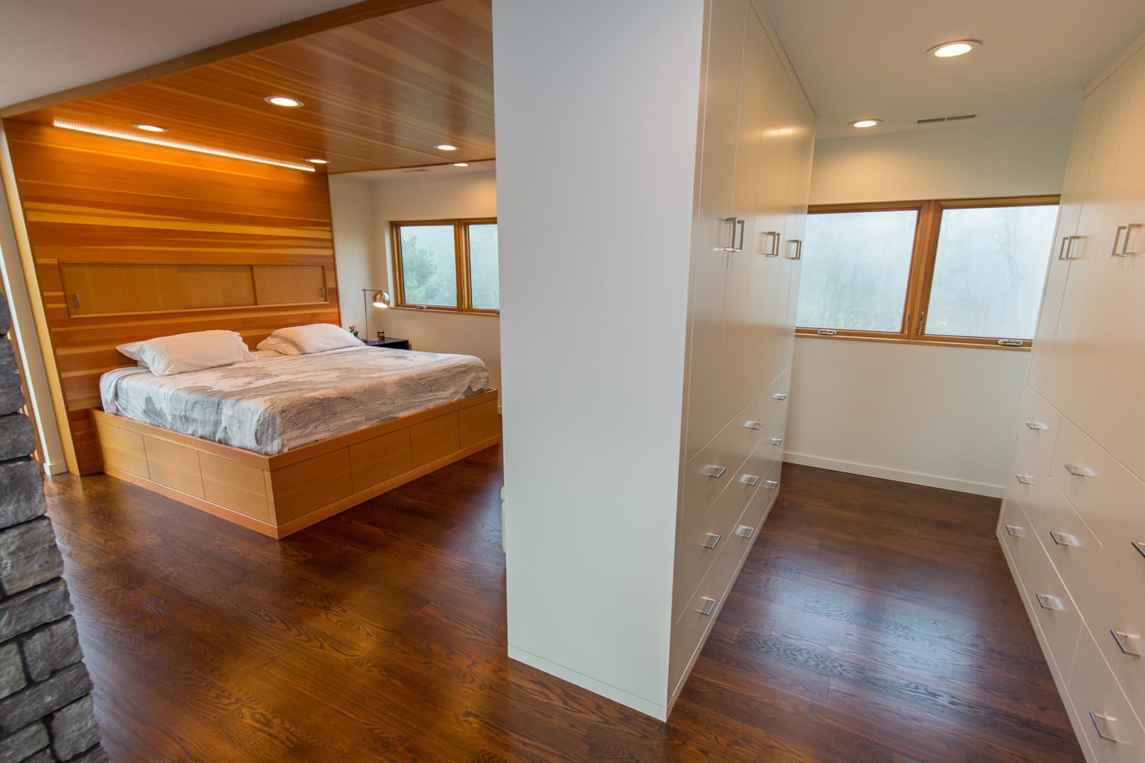 Primary suite with built-in wardrobe and dressing area